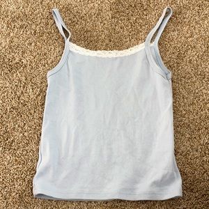 light blue tank. white laced neck line.